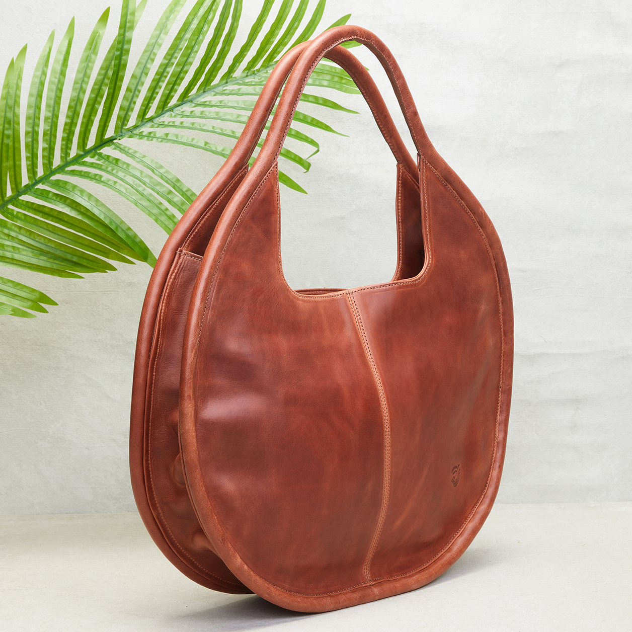 Carmen Round Leather Tote in Cognac - Image 5